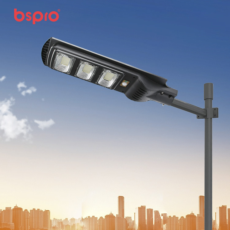Streetlight against city skyline background