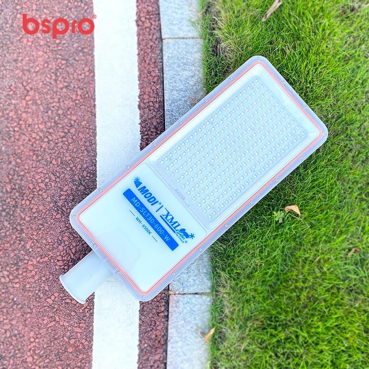 LED streetlight on pavement