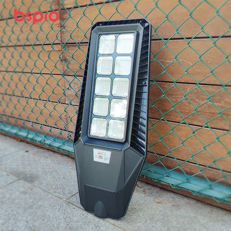 LED streetlight against a fence