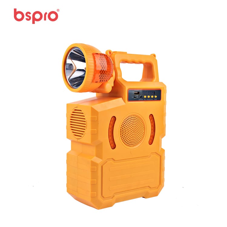 Orange portable speaker with flashlight