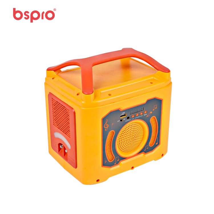 Portable yellow speaker with handle